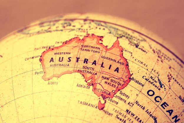 Australia Map in Red colour on Globe of yellow colour